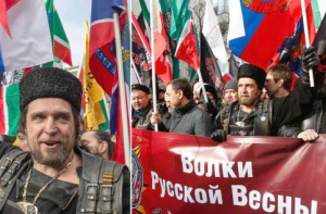 The leader of Night Wolves - Zaldostanov/"Surgeon" holds a banner:"Wolves of Russian Spring"