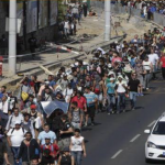 Hundreds of asylum seekers walking to Vienna on the M1 motorway