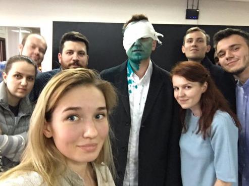 <em>Alexey Navalny and his supporters right after attack in Barnaul.</em>