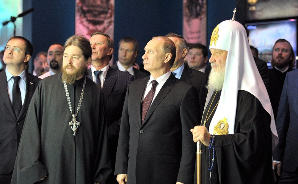 Bishop Tikhon Shevkunov, Vladimir Putin’s  rumored confessor, Vladimir Putin and Patriarch Kirill, Primate of the Russian Orthodox Church.