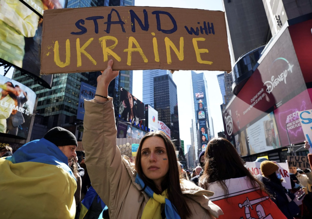 Rally in support of Ukraine in Time Square. American Russians and American Ukrainians rally together.